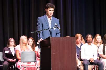 Mitchell Senko, a 2022 graduate of the University of Florida, addresses the Scholarship Foundation Class of 2024